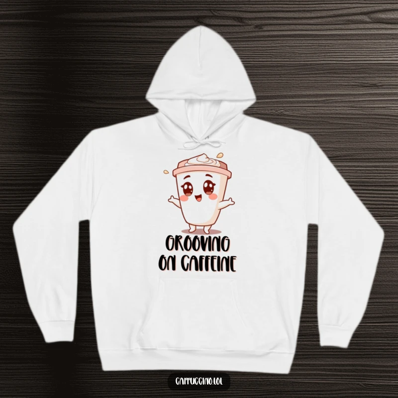 Funny hoodie with a cheerful cappuccino cup character doing a joyous shimmy, designed for ultimate comfort and smiles.